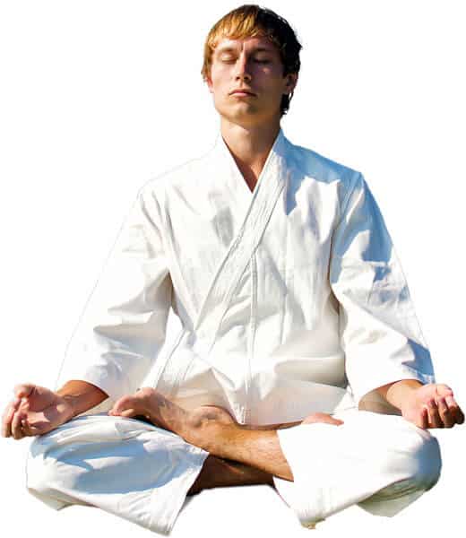 Martial Arts Lessons for Adults in Garner NC - Young Man Thinking and Meditating in White