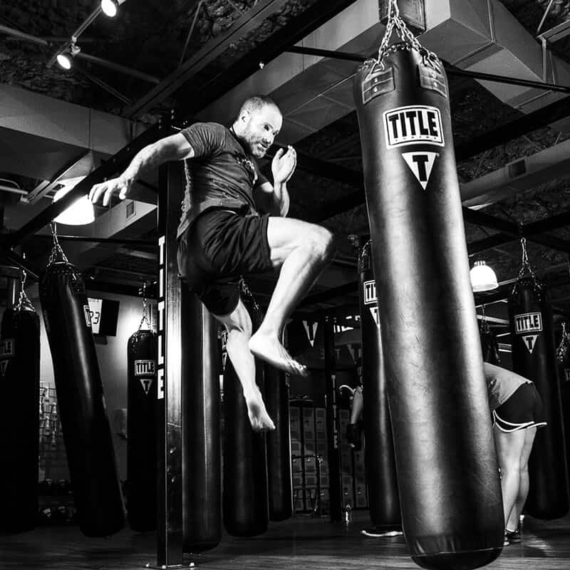 Mixed Martial Arts Lessons for Adults in Garner NC - Flying Knee Black and White MMA